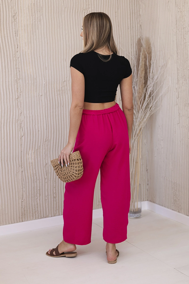 Fuchsia-coloured wide-waisted trousers