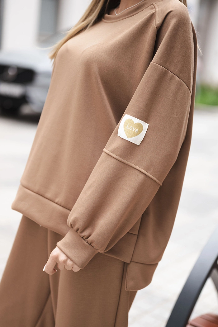 Kesi Włoski Women's set with a loose sweatshirt and pants with the word LOVE dark camel