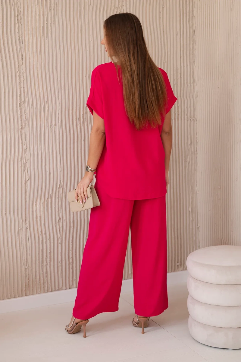 Set with necklace, blouse + fuchsia trousers