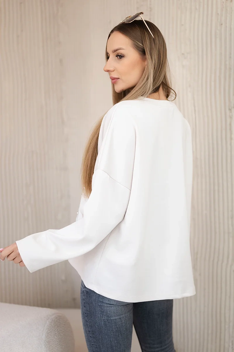 Kesi Włoski Butter fabric sweatshirt with a decorative flower beige