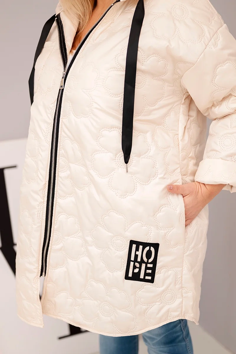 Kesi Włoski Dámska bunda Plus Size prešívaná s kapucňou a nápisom HOPE svetlo béžová