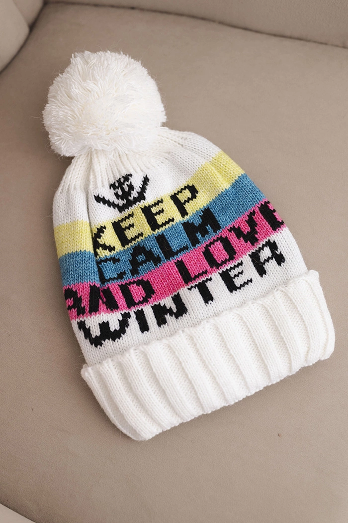 Kesi Women's winter cap with wool and lettering with a large pom-pom K422 white