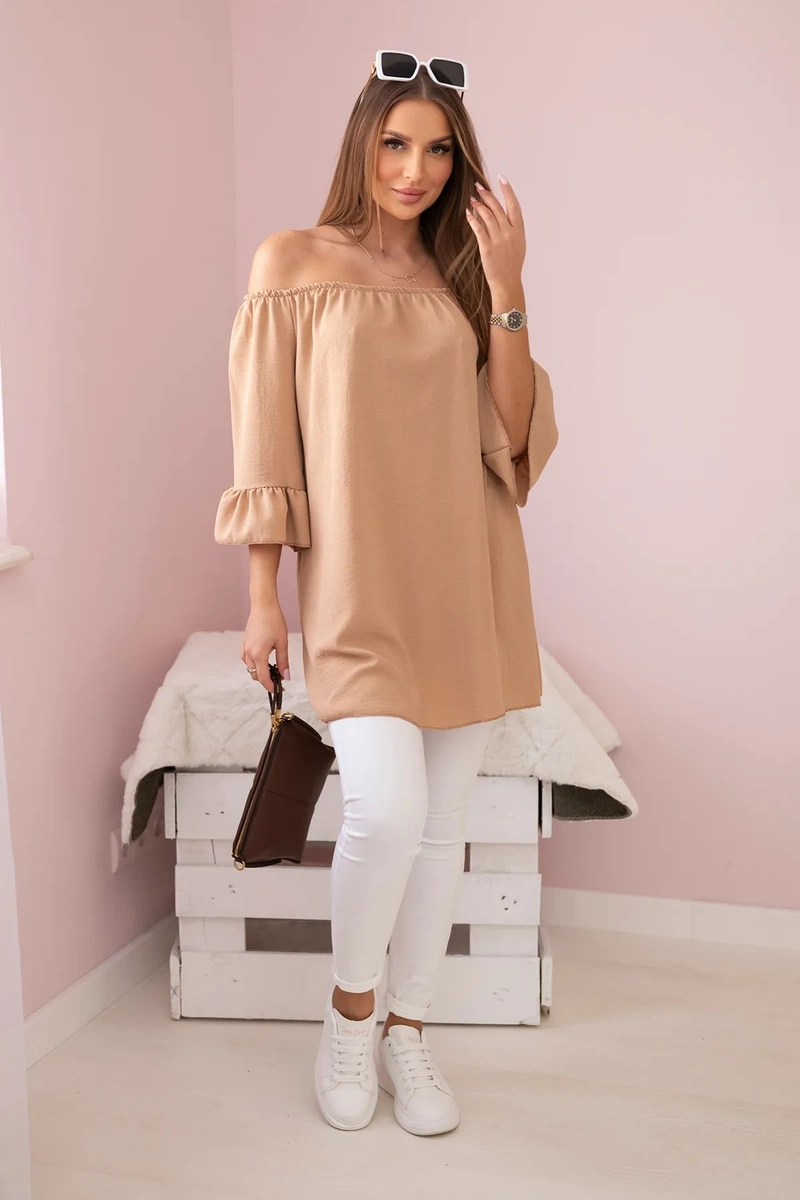 Spanish blouse with ruffles on a camel sleeve