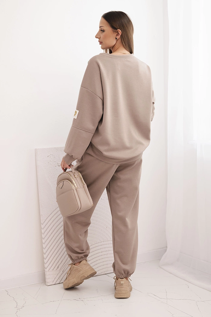 Kesi Włoski Women's set with a loose sweatshirt and pants with the inscription LOVE fango