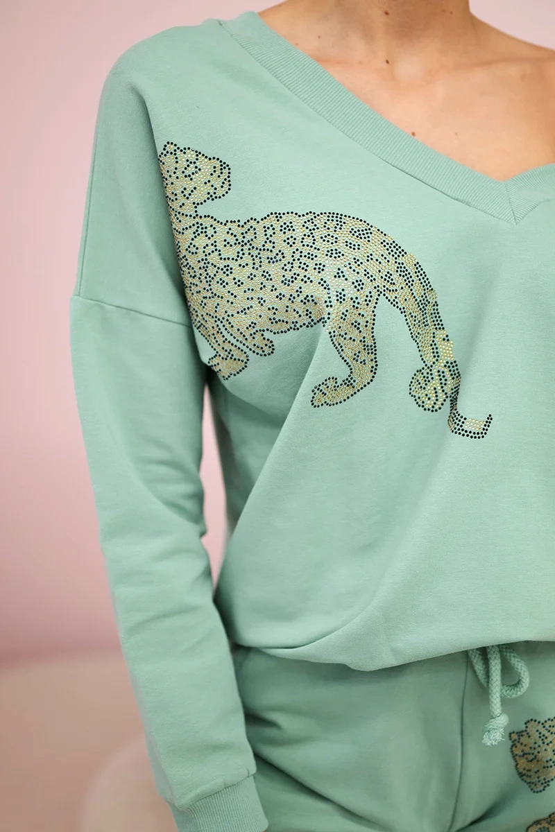 Set with zircon panther dark mint