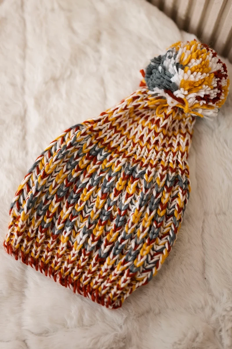 Kesi Cap with a pompom Maria K335 mustard