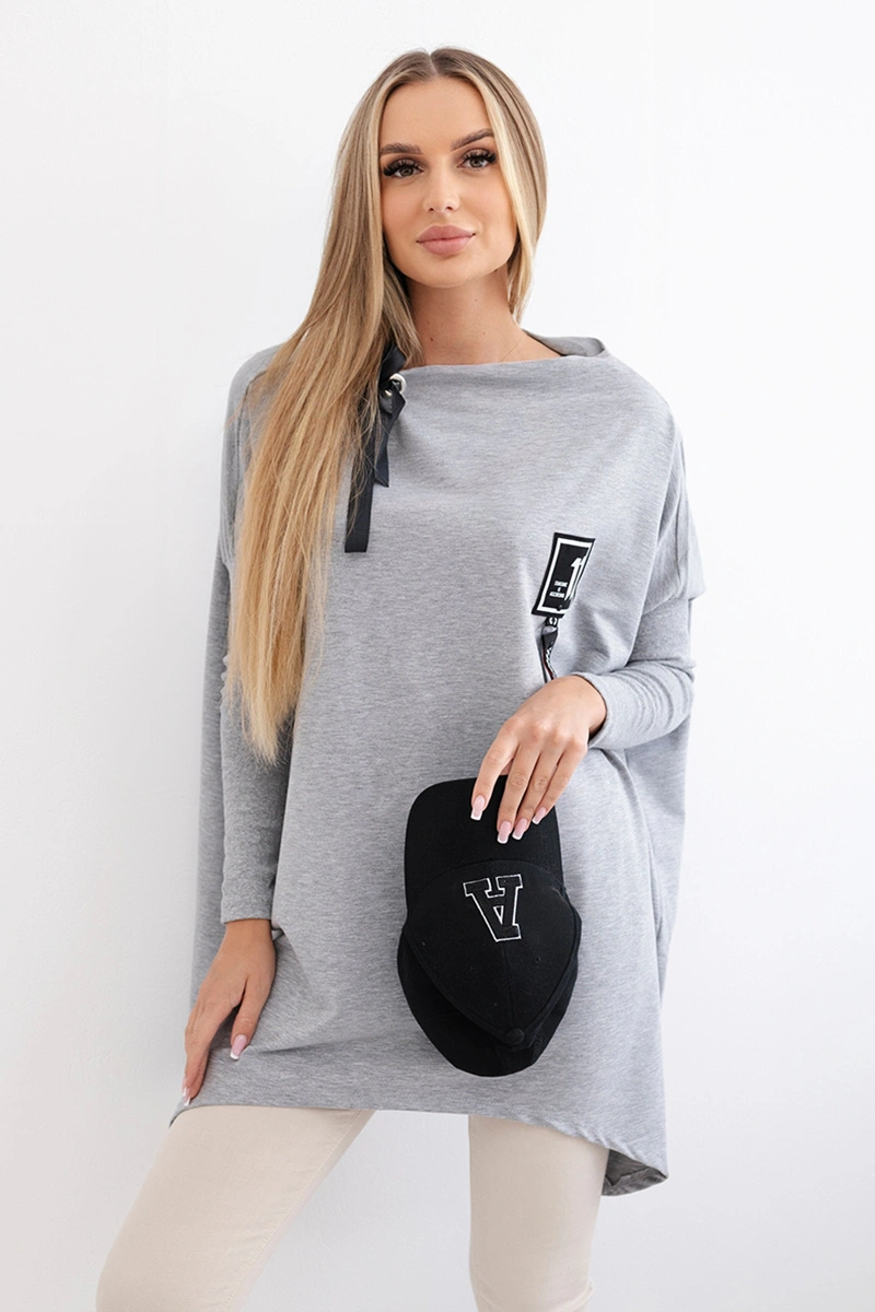 Oversize sweatshirt with asymmetrical sides in gray color