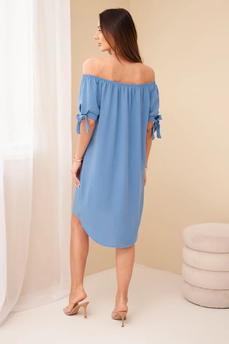 Dress with ties on the sleeves dark jeans