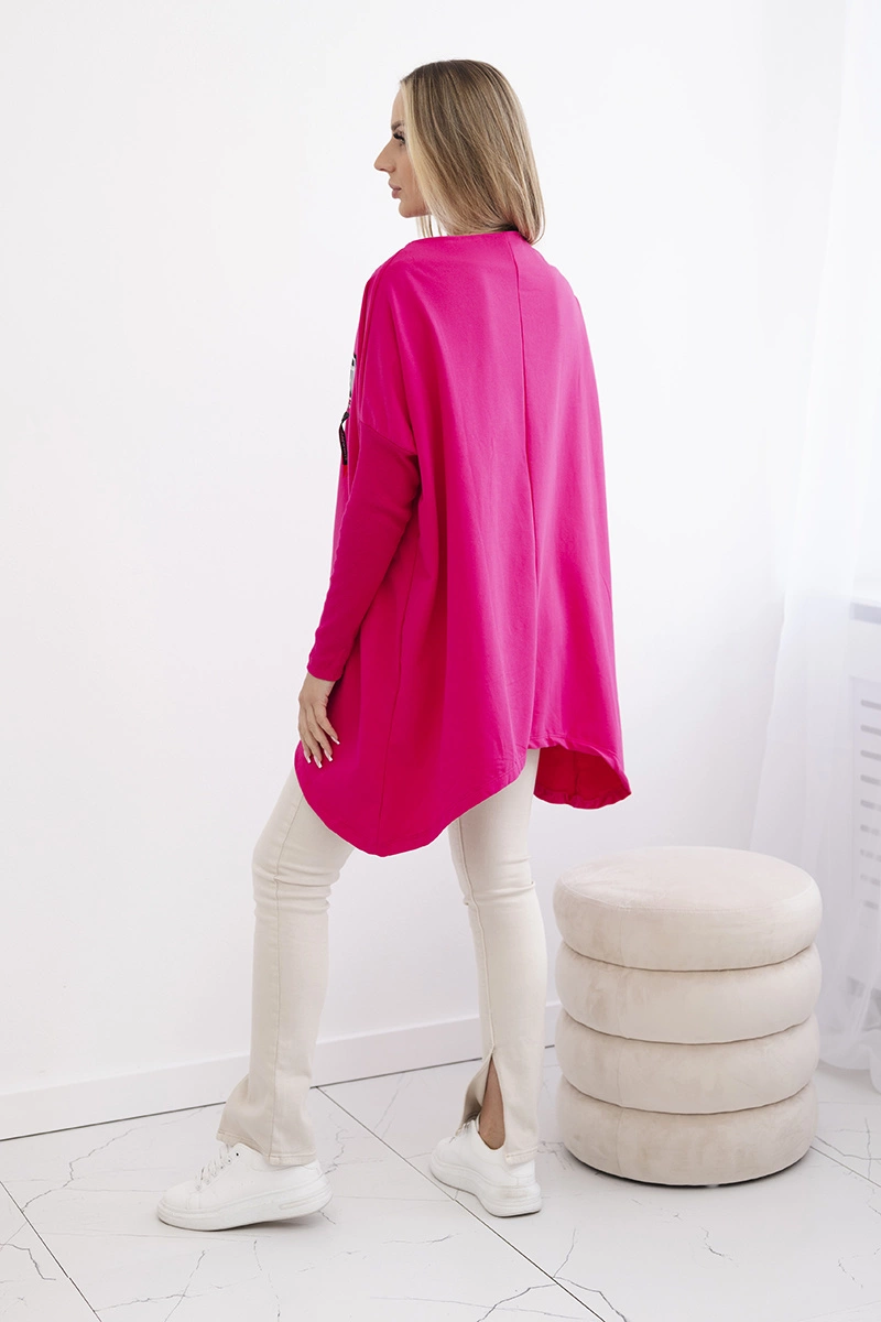 Oversized sweatshirt with asymmetrical sides in fuchsia color