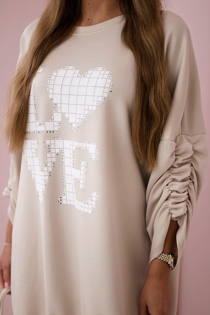 Kesi Włoski Dress with a longer back and print beige