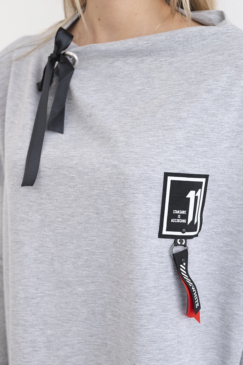 Oversize sweatshirt with asymmetrical sides in gray color