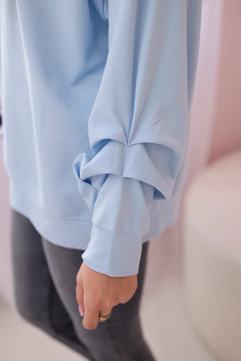 Cotton blouse with bow in blue