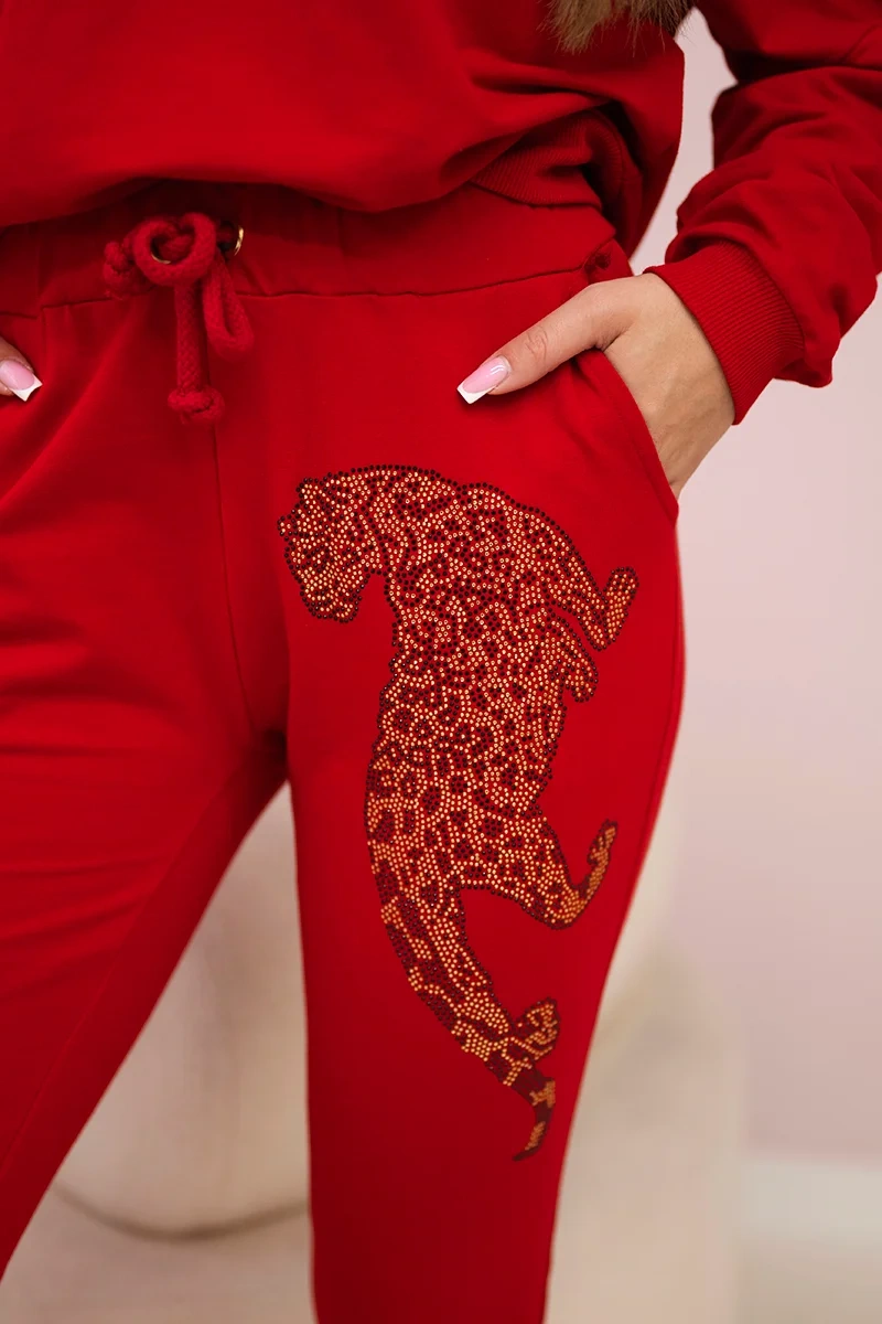 Fitted with panther red zircon