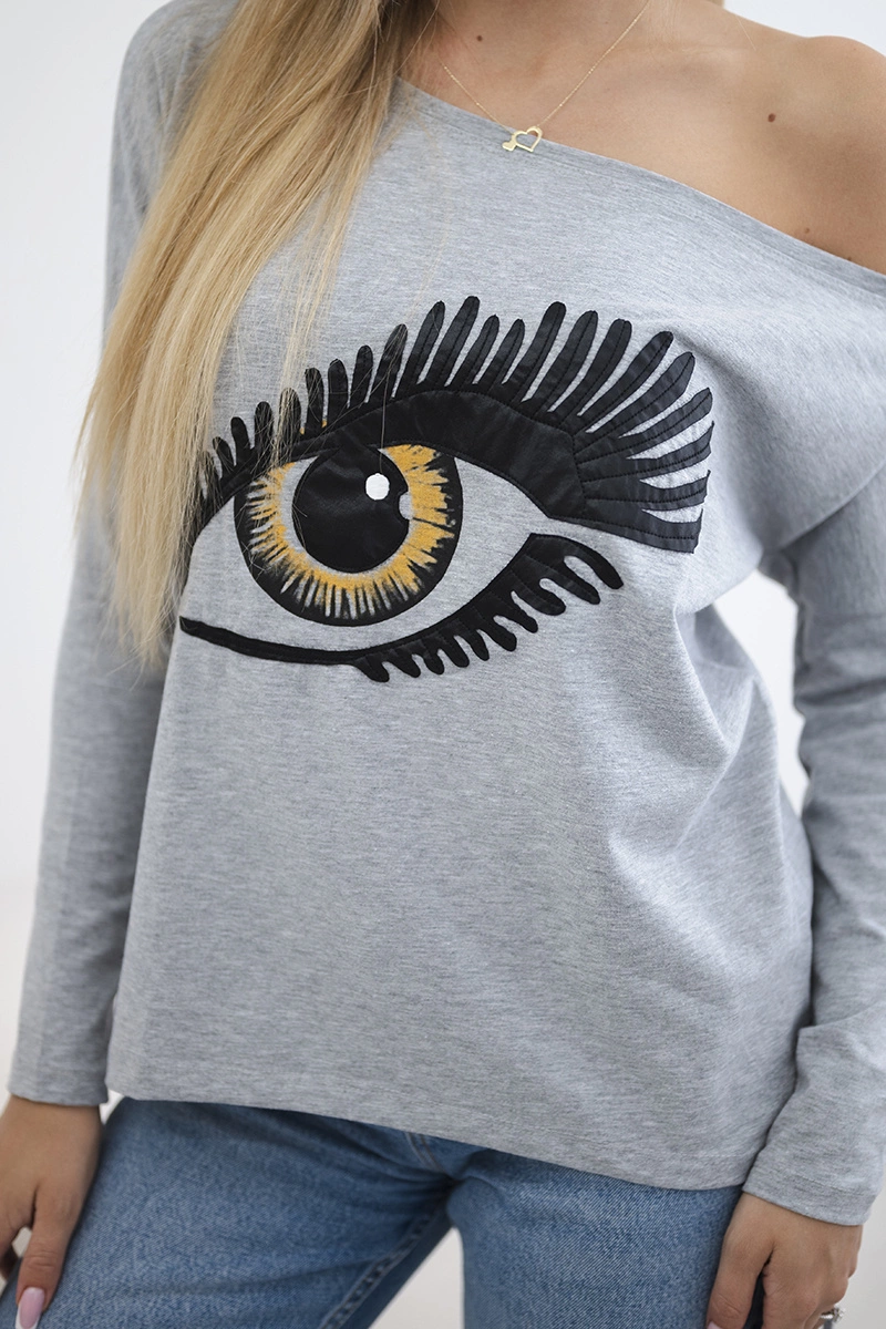 Printed blouse with a longer back in grey