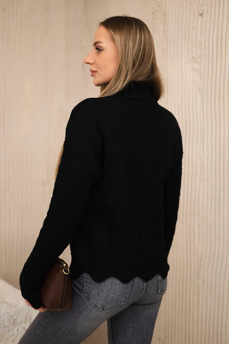 Black sweater with decorative ruffle
