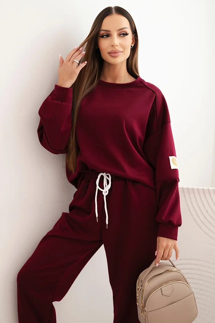 Kesi Włoski Ladies' butter set with a loose sweatshirt and pants with the inscription LOVE khaki