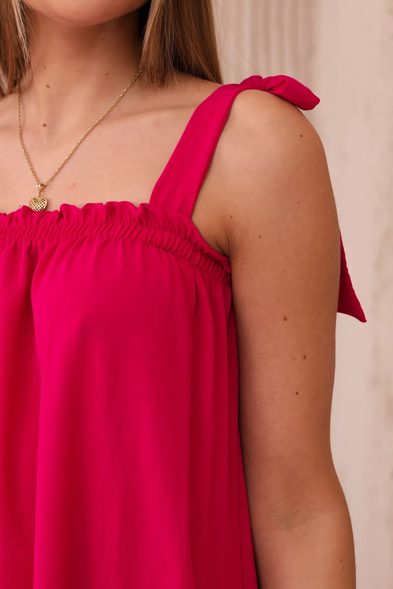 Blouse with fuchsia bow