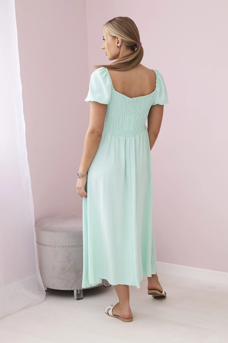 Kesi Włoski Ruffled dress with a tie at the neckline mint