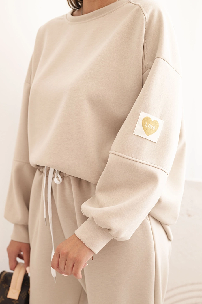 Kesi Włoski Ladies&#039; butter set with a loose sweatshirt and pants with the word LOVE beige