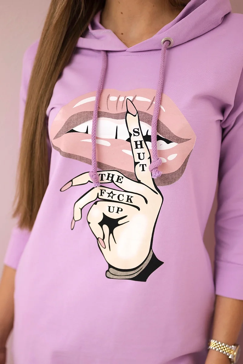 Dress with a longer back and a colorful purple print