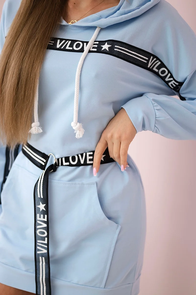 Dress decorated with a tape with inscriptions cyan