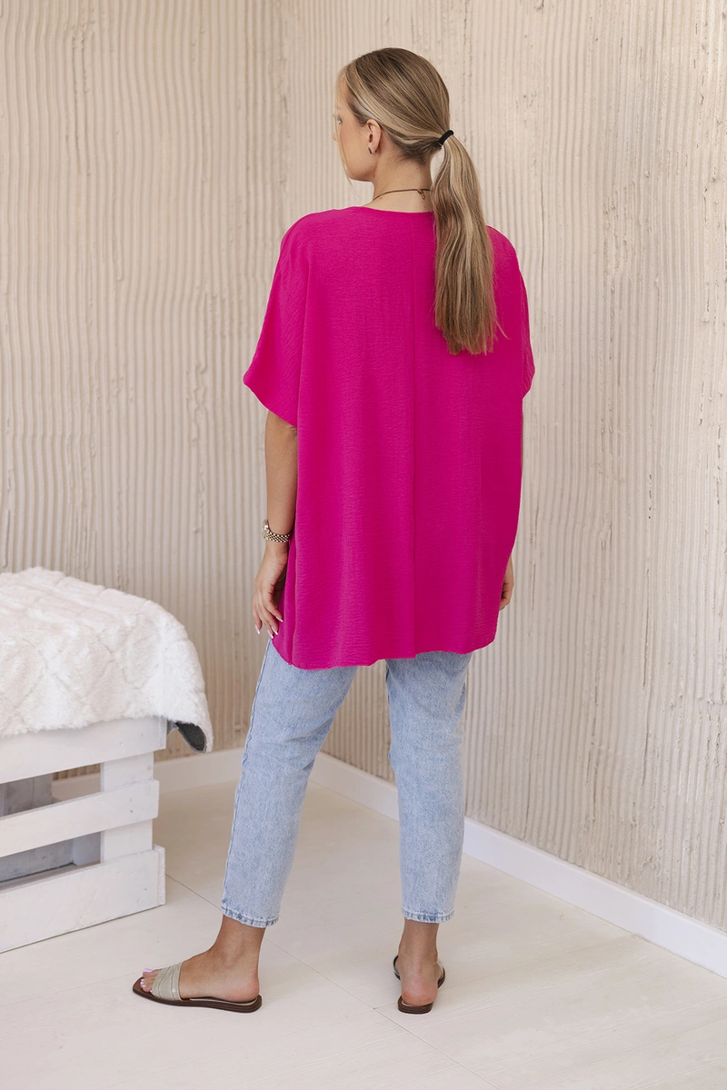 Oversized blouse with fuchsia-colored pendant