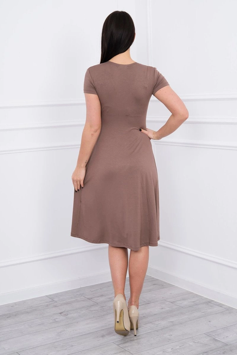 Dress cut below the chest, long sleeves, cappuccino with short sleeves