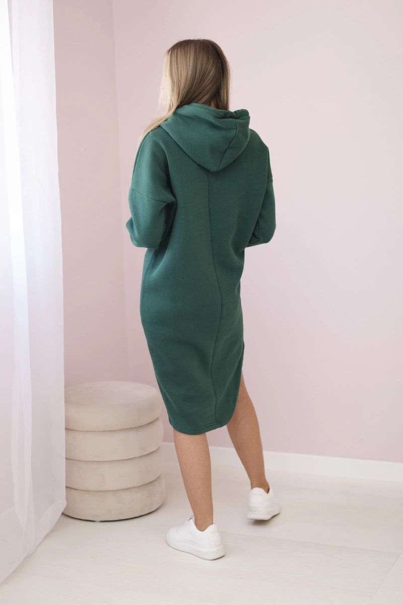 Dress with a hood and a slit on the side green