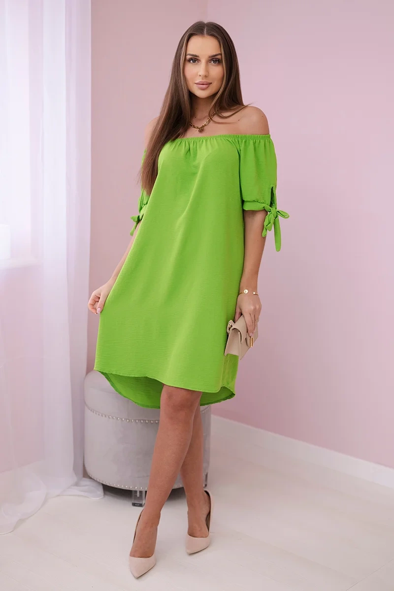 Pistachio dress with ties on the sleeves