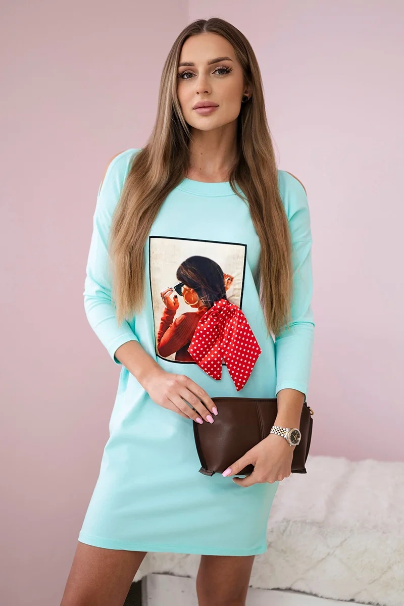 Dress with graphics and bow in polka dot 3D mint