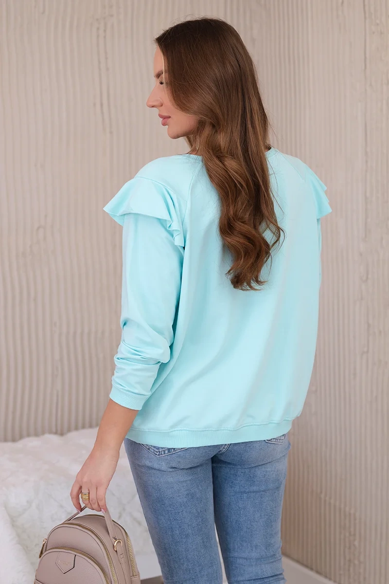 Cotton blouse with ruffles on the shoulders mint