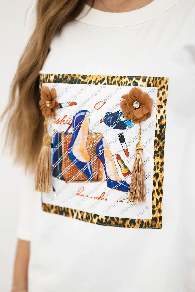 Dress with 3D graphics and decorative pom pom ecru