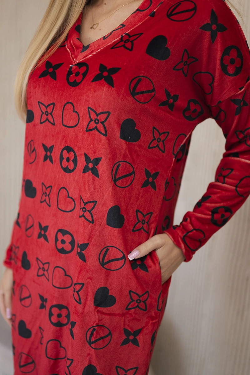 Velvet dress with a decorative red pattern