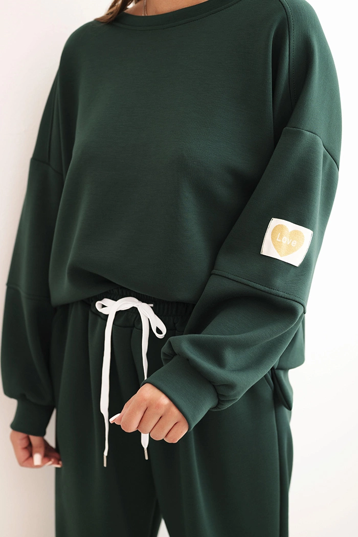 Kesi Włoski Women's set with a loose sweatshirt and pants with the word LOVE dark green