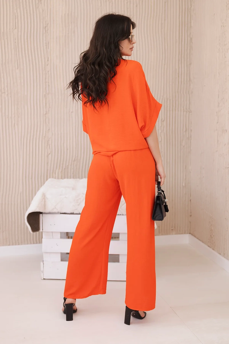 Set of blouses with orange trousers