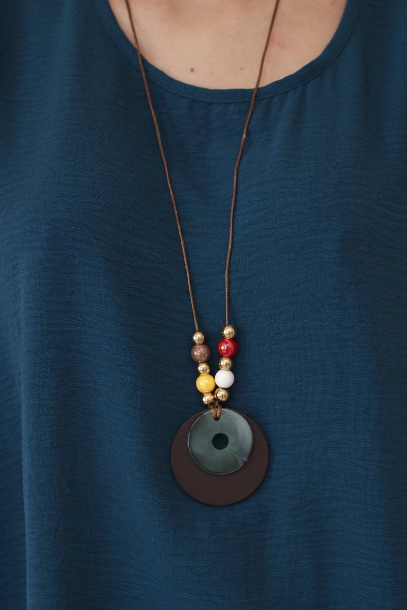 Oversized blouse with nautical pendant