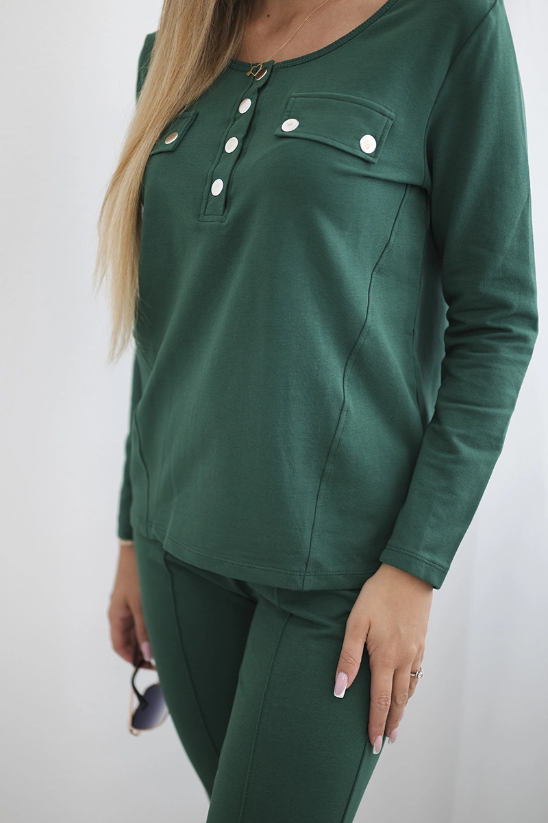 Set with a green press stud neckline