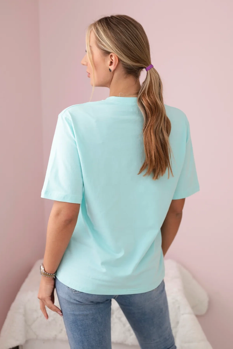 Cotton blouse with floral print in light mint color