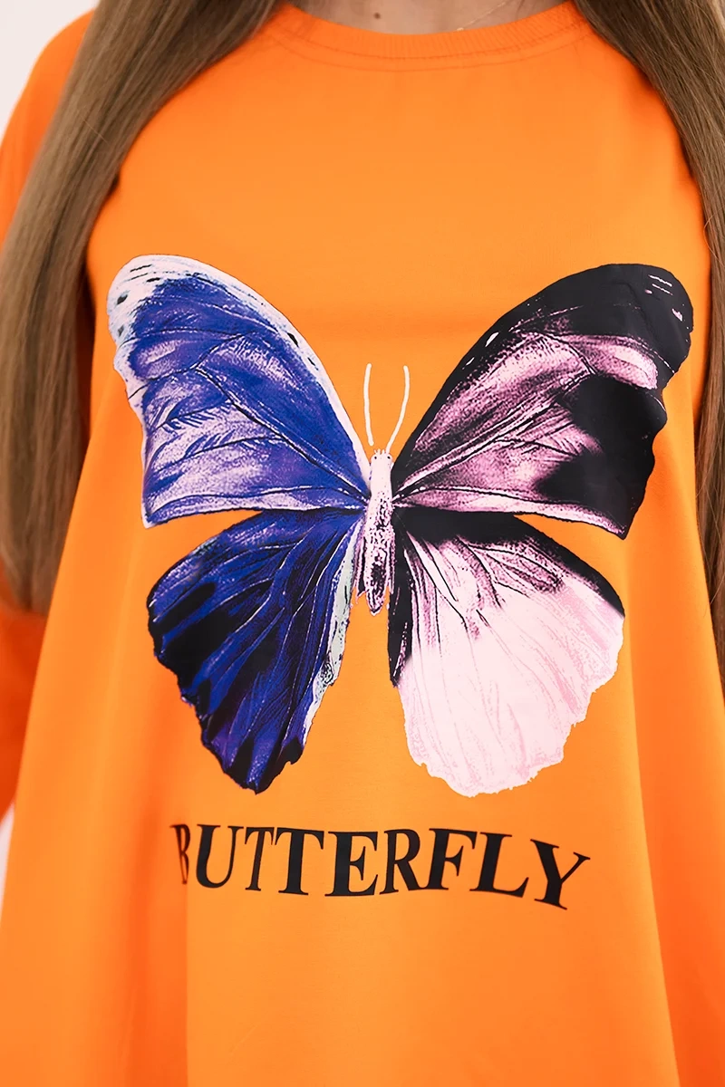 Blouse with oversize orange print