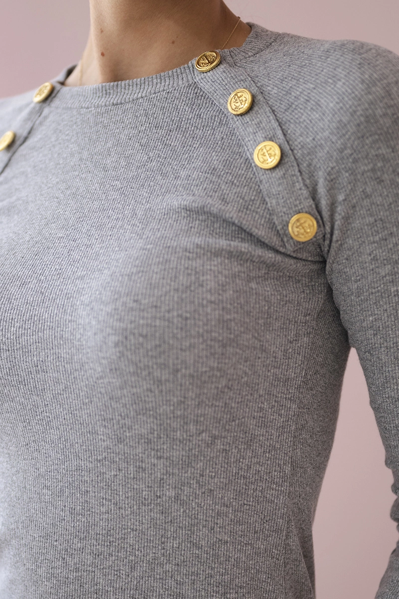 Dress with decorative buttons in gray color