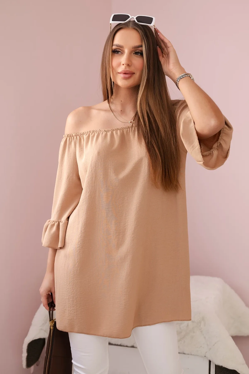 Spanish blouse with ruffles on a camel sleeve