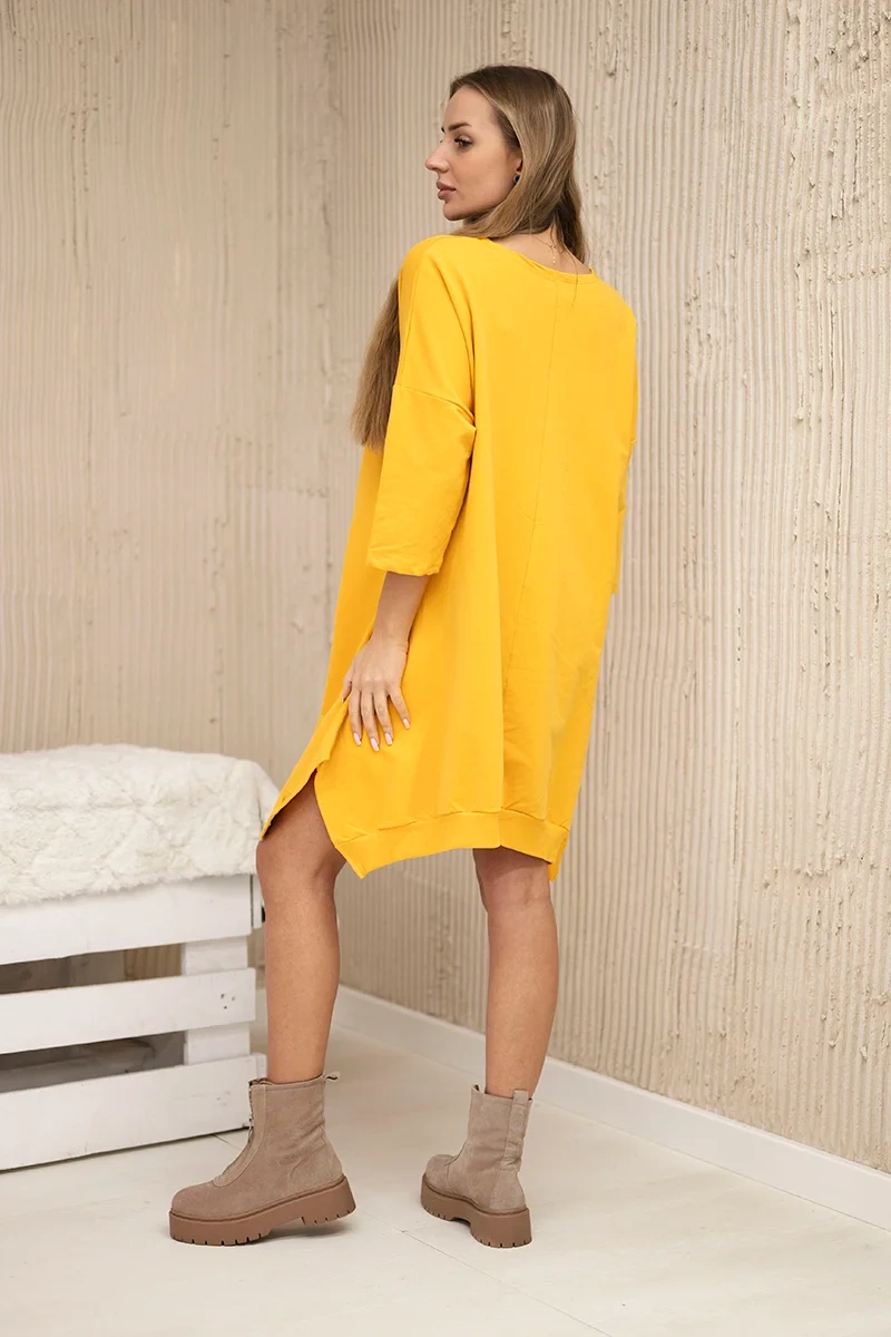 Dress with print and flared mustard bottom