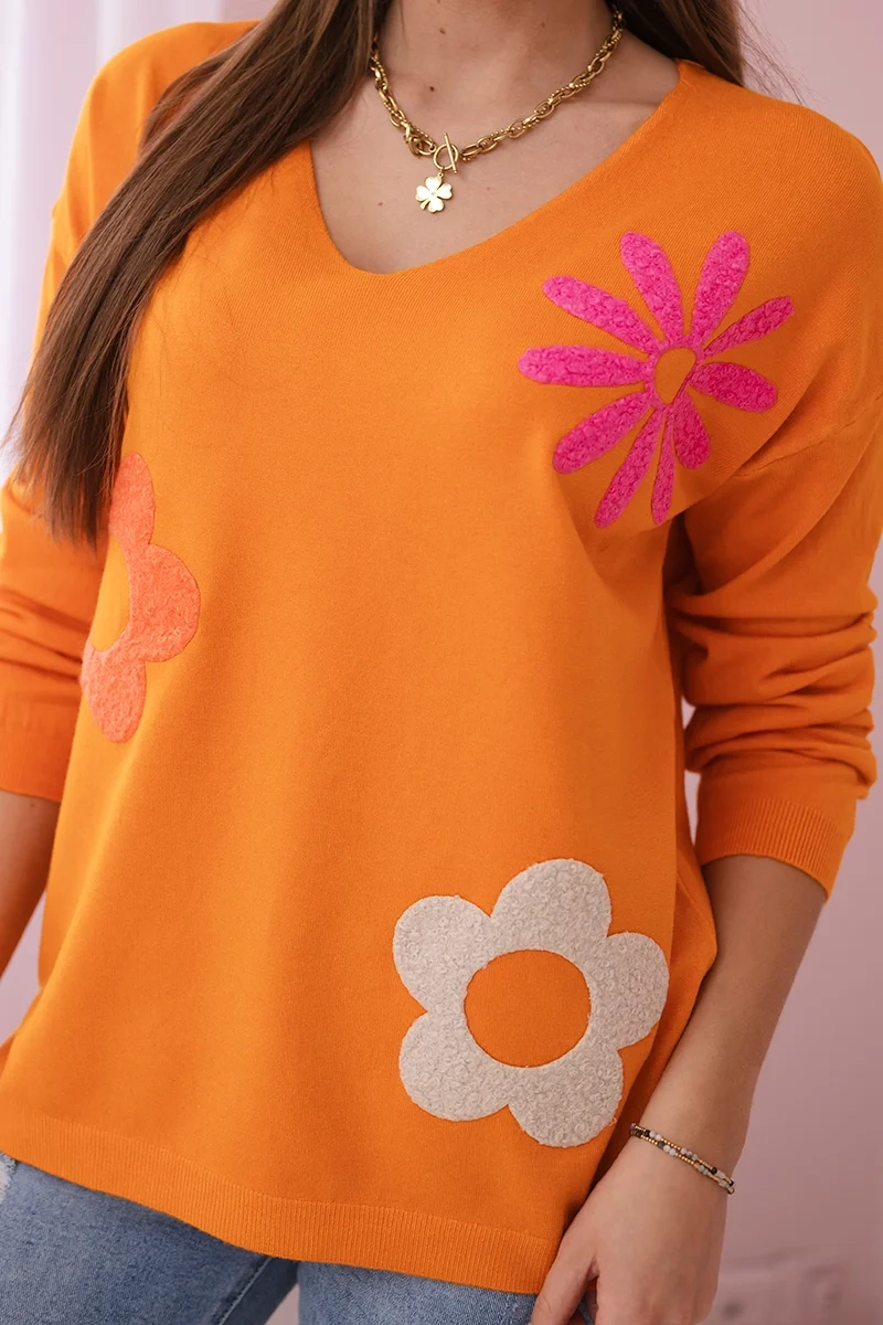 Sweater blouse with orange floral pattern