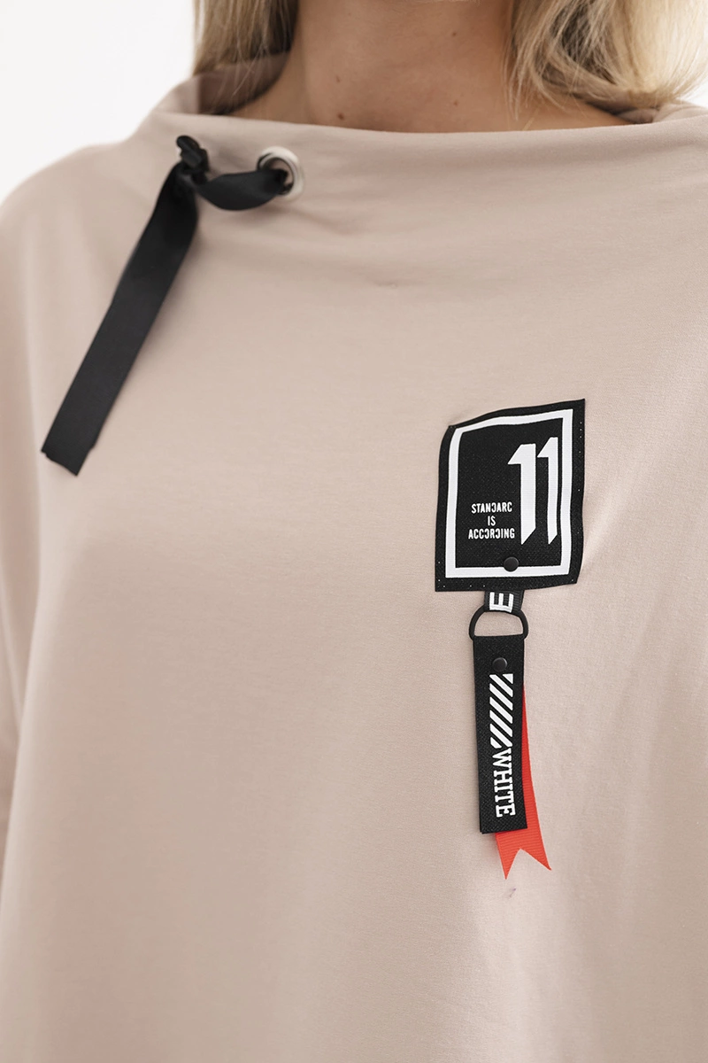 Oversized sweatshirt with asymmetrical sides in beige color