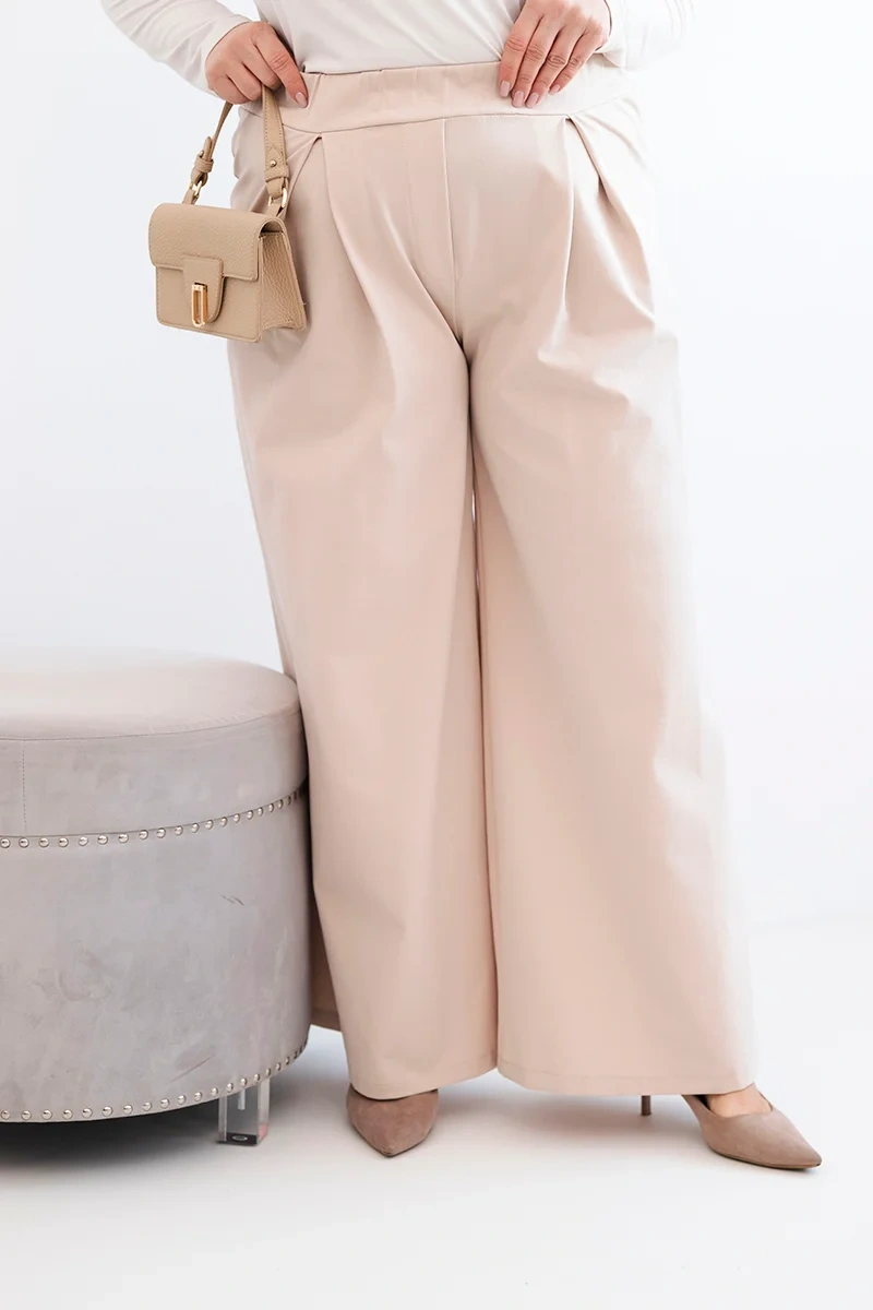 Широки панталони с големи размери и плисета