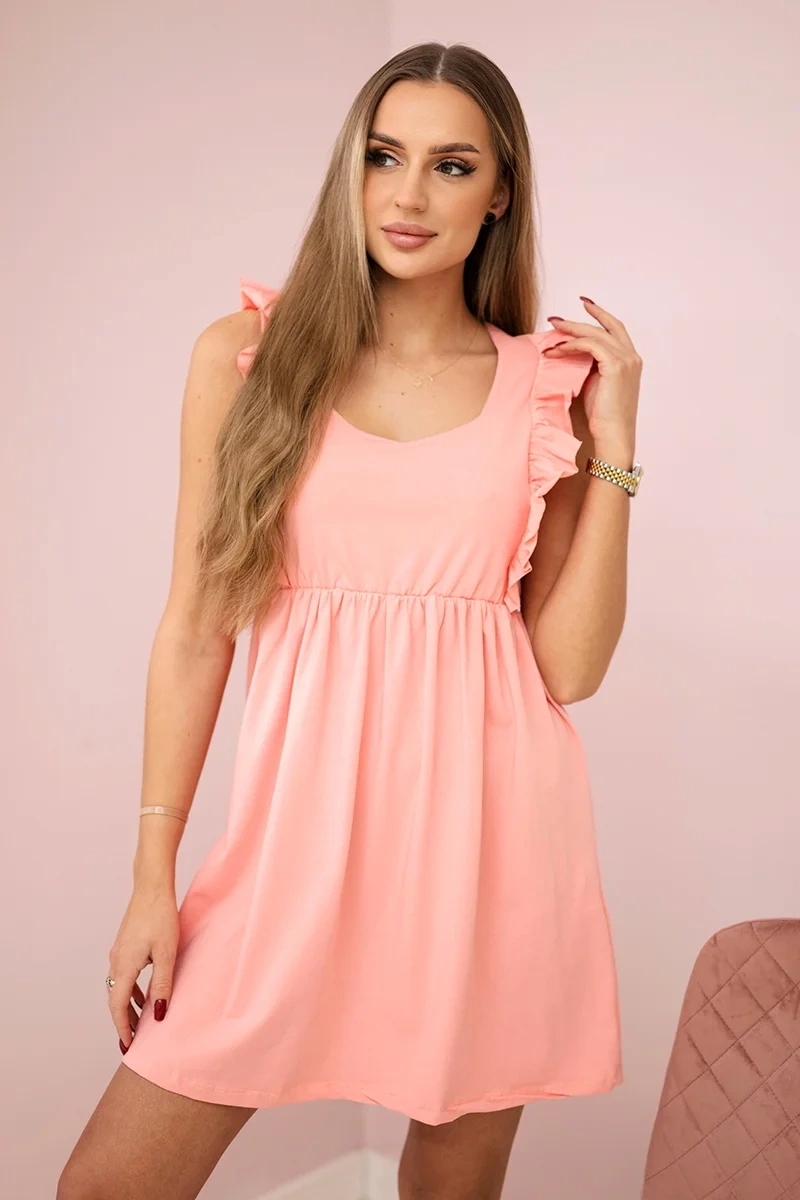 Dress with ruffles on the sides apricot