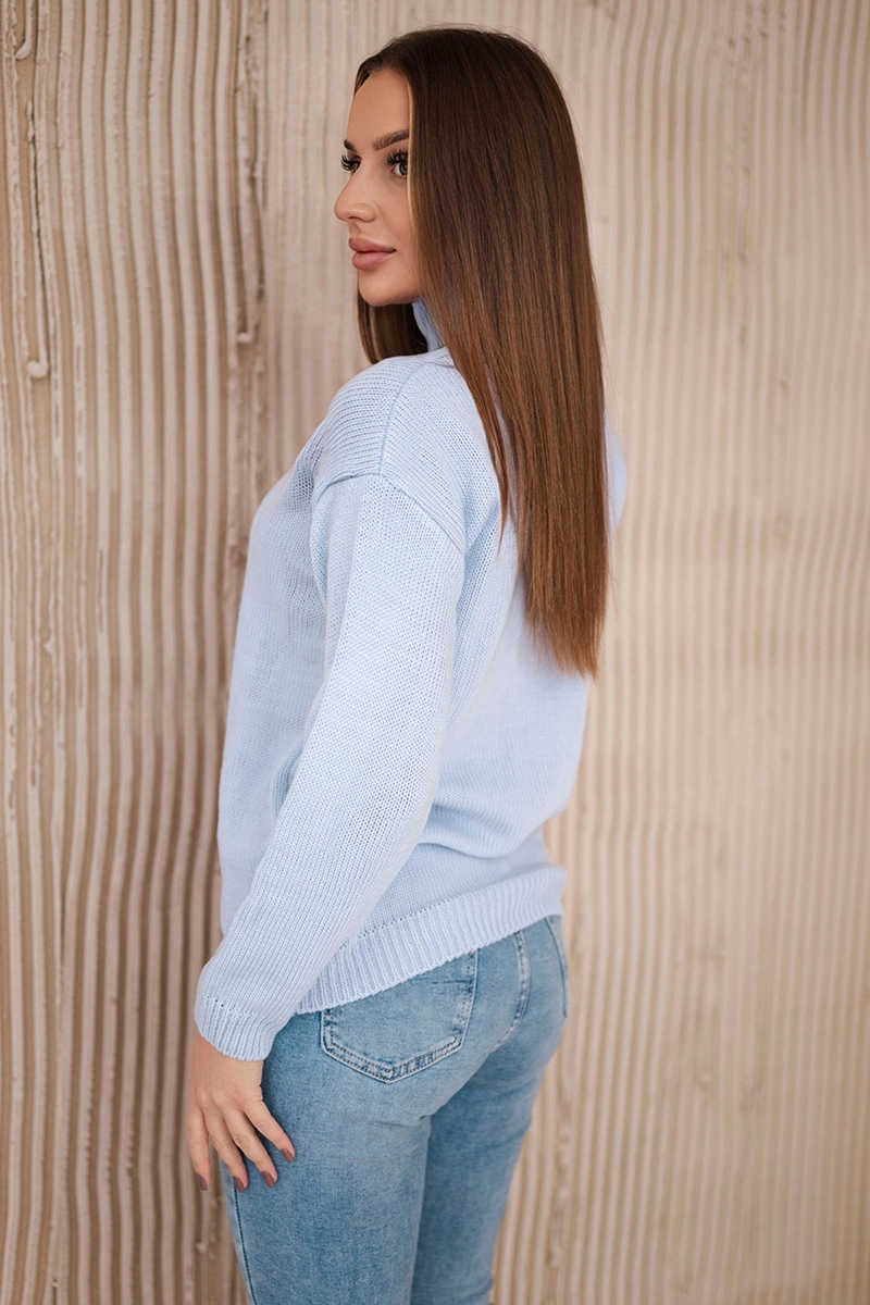 Blue sweater with high neckline