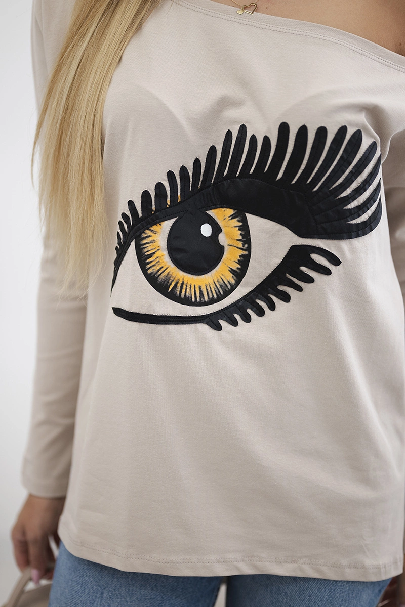 Blouse with print and longer back beige