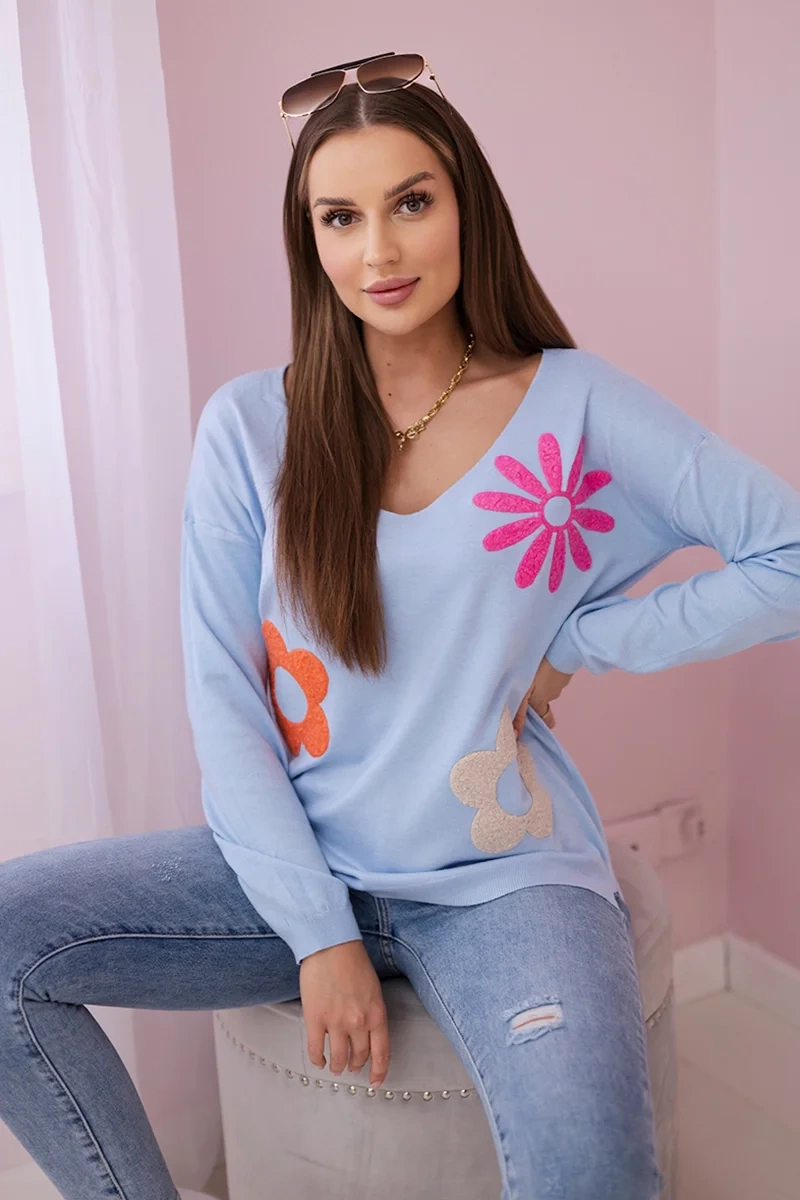 Sweater blouse with blue floral pattern