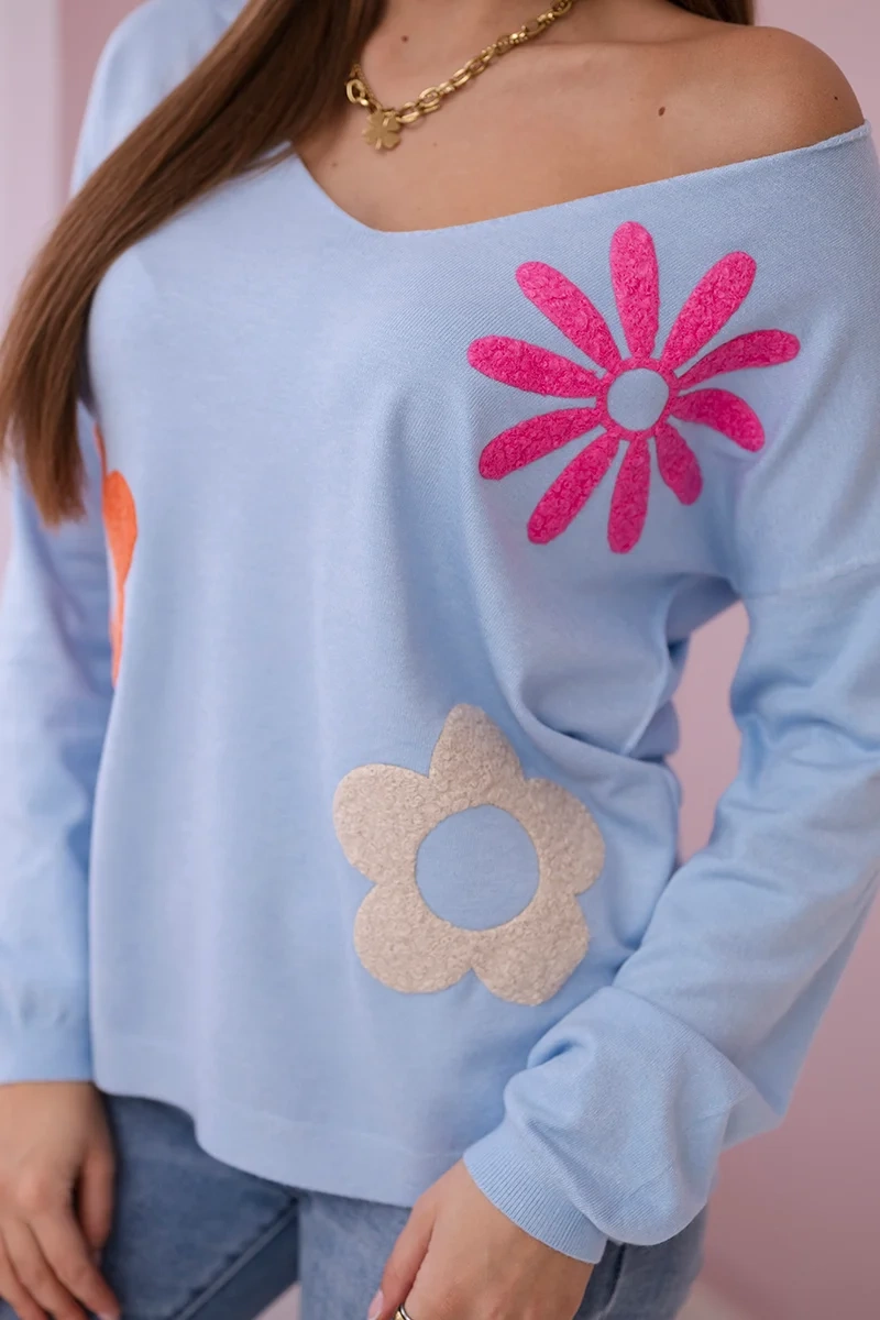 Sweater blouse with blue floral pattern